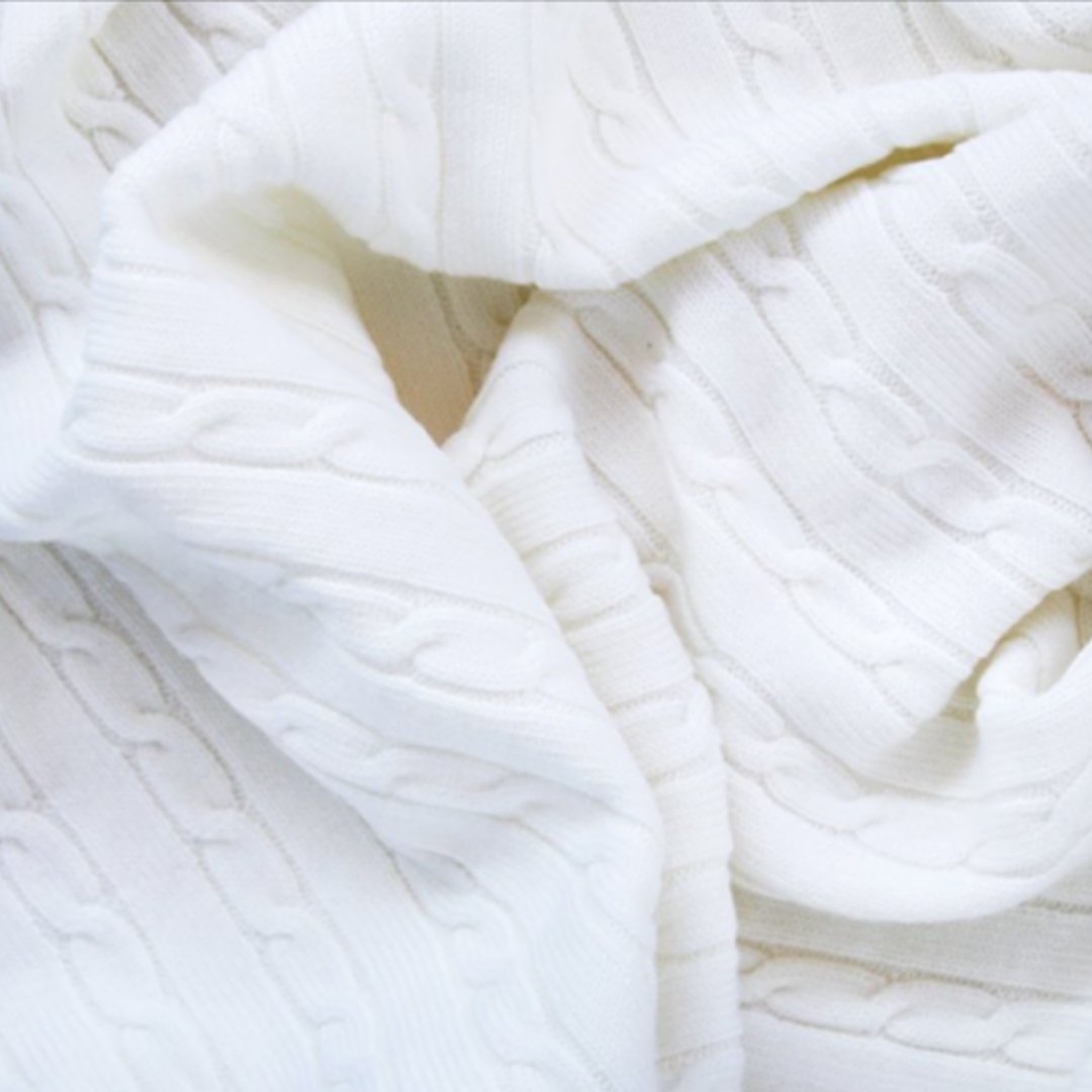 Copertina neonato in lana con trecce 